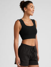 black square neck cropped tank with thick straps.